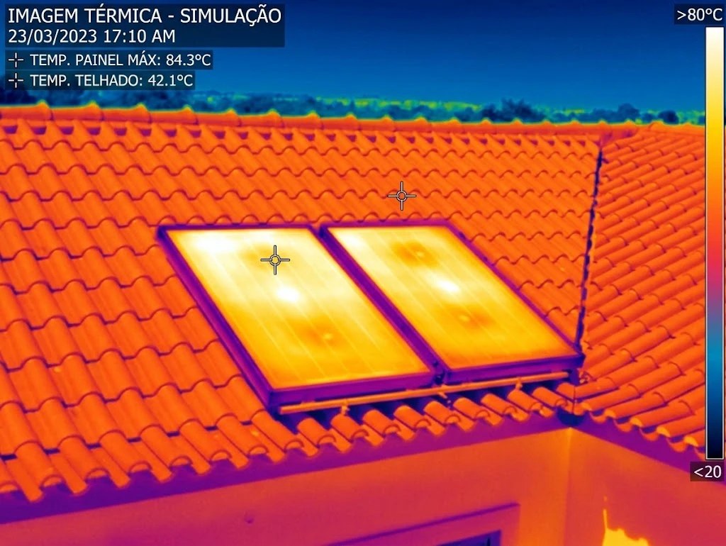 Imagem térmica simulada de dois painéis solares num telhado, com pontos quentes assinalados